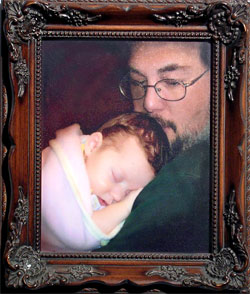 grandfather holding baby framed